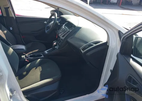 2014 Ford Focus Se z USA, uszkodzony, nr VIN 1FADP3F23EL302031